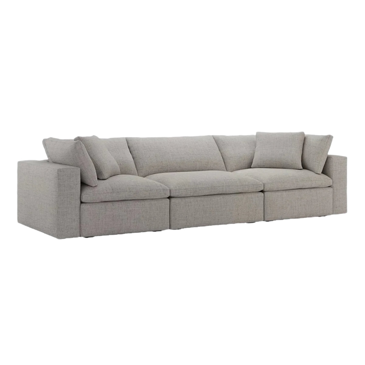 Light grey sectional sofa with three seating sections, back cushions, and throw pillows
