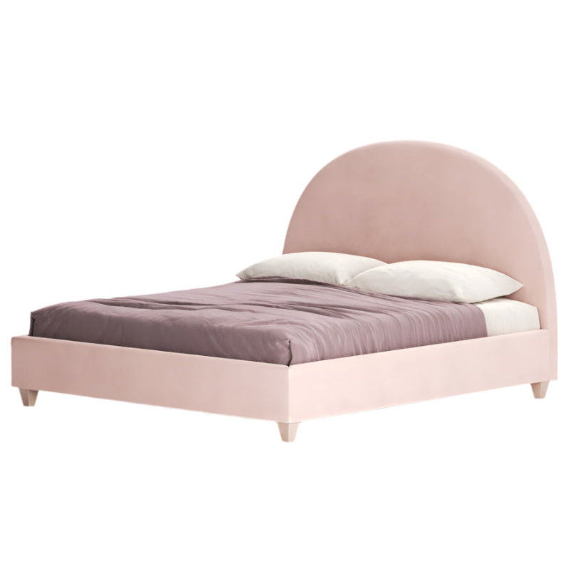 The Luna bed, with its circular headboard, exudes a sense of simplicity.
