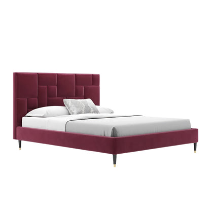 Upholstered bed in burgundy fabric with rectangular headboard panels and grey bedding
