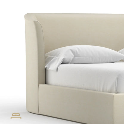 Modern double bed in soft beige fabric with a cozy corner headboard, creating a serene and inviting bedroom look