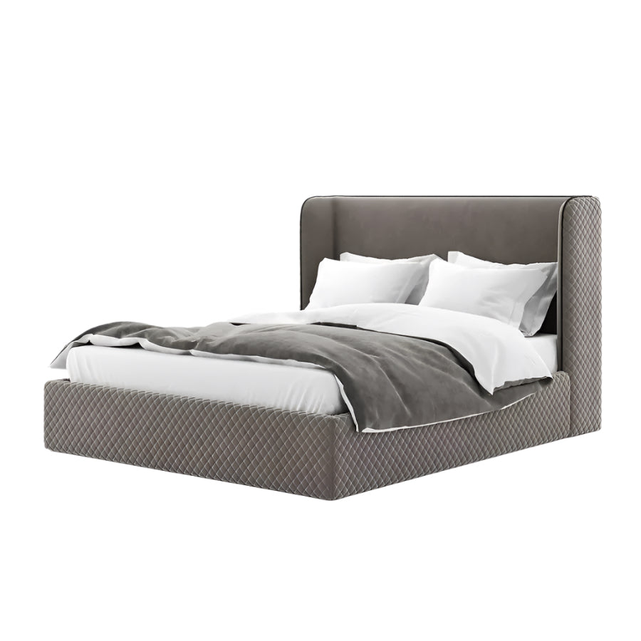 Light fabric bed featuring tall headboard and grey blanket on white sheets