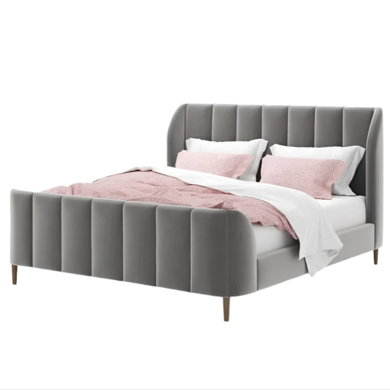 Upholstered bed in grey fabric with vertical panels and wooden legs